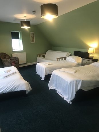 Imagen de la habitación del Hotel The Dorrington. Foto 11