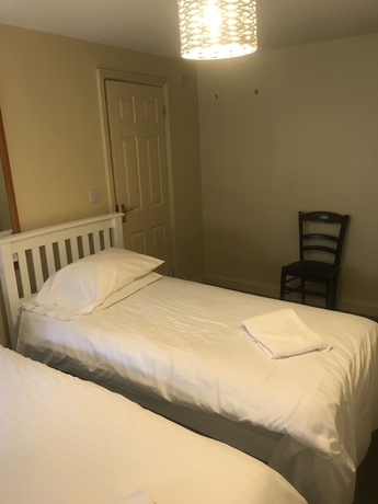 Imagen de la habitación del Hotel The Dorrington. Foto 12