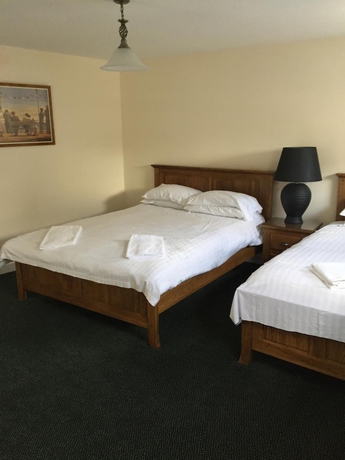 Imagen de la habitación del Hotel The Dorrington. Foto 14