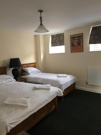 Imagen de la habitación del Hotel The Dorrington. Foto 16