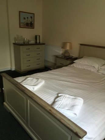 Imagen de la habitación del Hotel The Dorrington. Foto 17