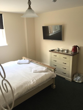 Imagen de la habitación del Hotel The Dorrington. Foto 18