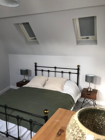 Imagen de la habitación del Hotel The Dorrington. Foto 19