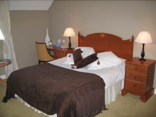 Imagen de la habitación del Hotel The Double Red Duke. Foto 8