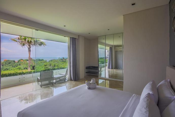 Imagen de la habitación del Hotel The Double View Mansions Bali. Foto 9