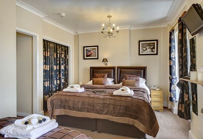Imagen de la habitación del Hotel The Downs Babbacombe. Foto 12