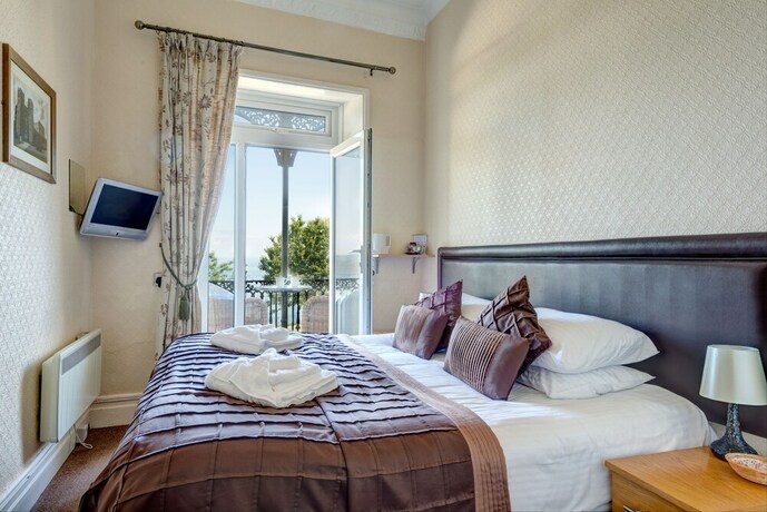 Imagen de la habitación del Hotel The Downs Babbacombe. Foto 19