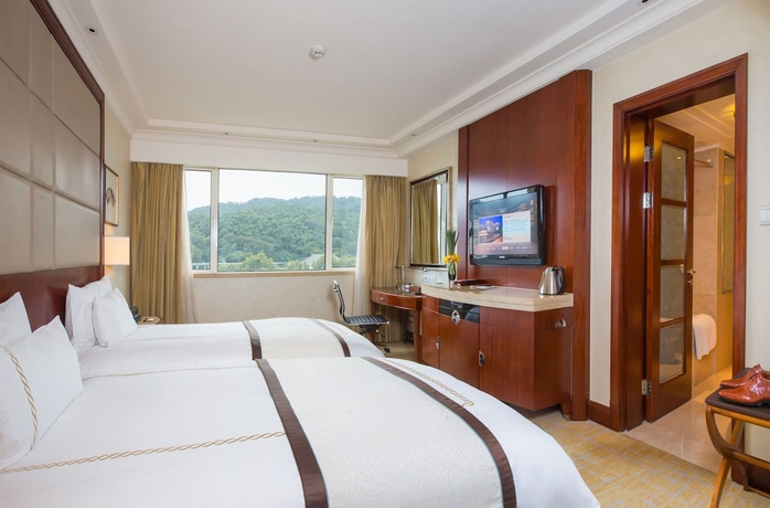 Imagen de la habitación del Hotel The Dragon Hangzhou. Foto 3