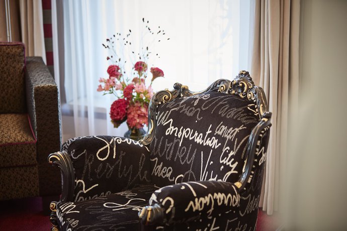 Imagen de la habitación del Hotel The Dufour by Hotel Schweizerhof. Foto 10