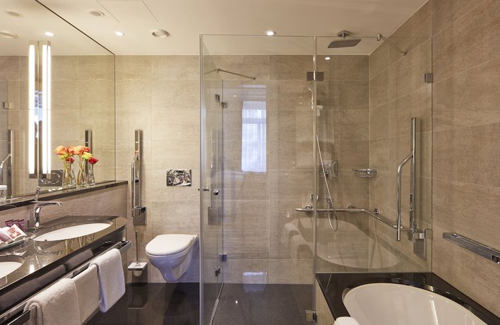 Imagen de la habitación del Hotel The Dufour by Hotel Schweizerhof. Foto 16