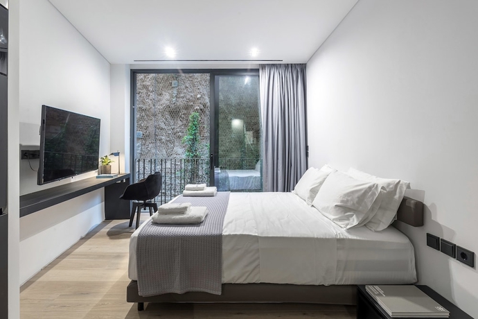 Imagen de la habitación del Hotel The Duke Boutique Suites. Foto 13