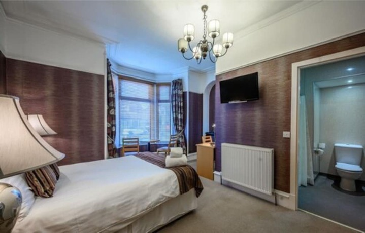 Imagen de la habitación del Hotel The Dunavon. Foto 10