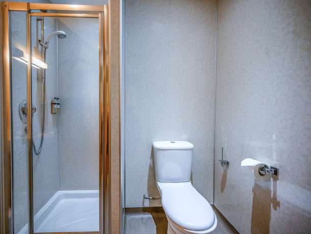 Imagen de la habitación del Hotel The Dunavon. Foto 12