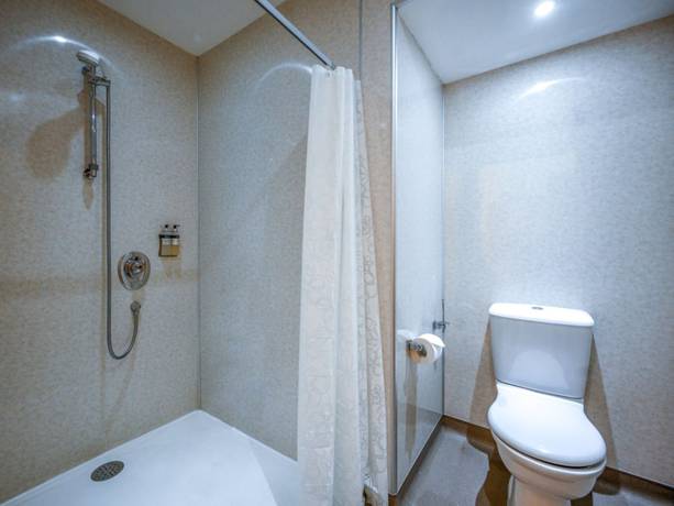 Imagen de la habitación del Hotel The Dunavon. Foto 14