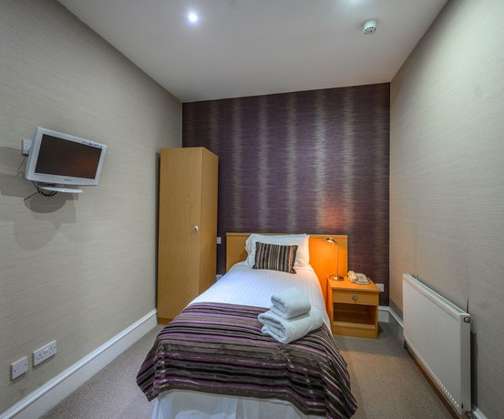 Imagen de la habitación del Hotel The Dunavon. Foto 17