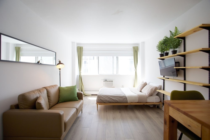 Imagen de la habitación del Hotel The Durocher Apartments. Foto 13