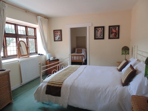 Imagen de la habitación del Hotel The Dusthole. Foto 14