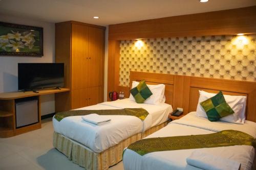 Imagen de la habitación del Hotel The ESSE Pattaya. Foto 19