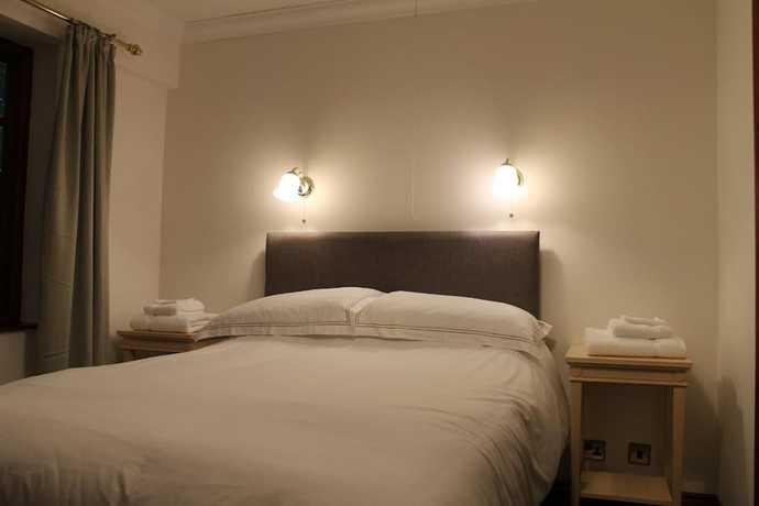 Imagen de la habitación del Hotel The Eagle House. Foto 3