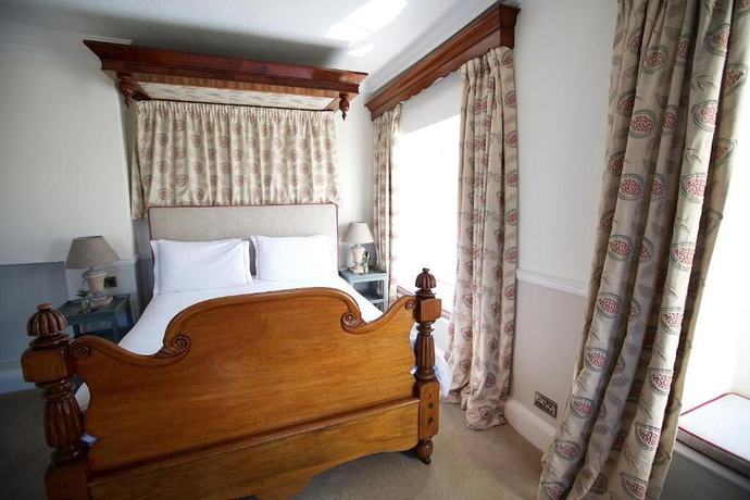 Imagen de la habitación del Hotel The Eagle House. Foto 6