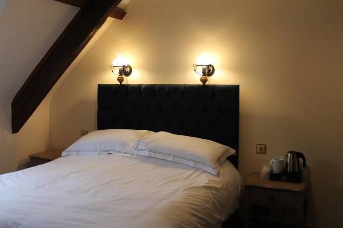 Imagen de la habitación del Hotel The Eagle House. Foto 13