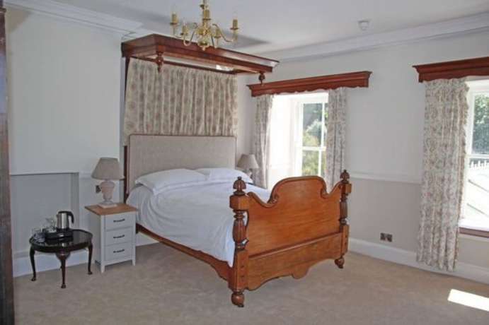 Imagen de la habitación del Hotel The Eagle House. Foto 14