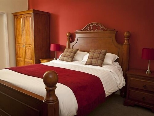 Imagen de la habitación del Hotel The Eagles. Foto 11