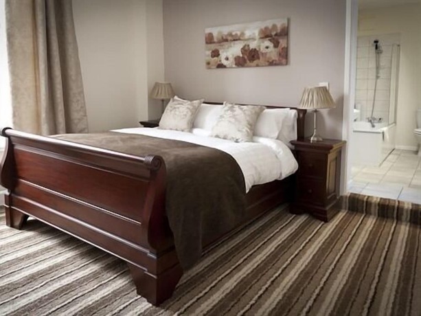 Imagen de la habitación del Hotel The Eagles. Foto 19