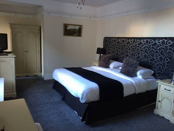 Imagen de la habitación del Hotel The Eagles. Foto 20