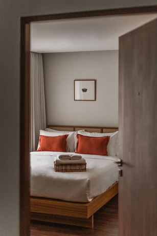 Imagen de la habitación del Hotel The Earth. Foto 6