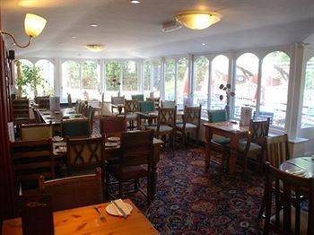 Imagen del bar/restaurante del Hotel The Eaton Oak. Foto 2