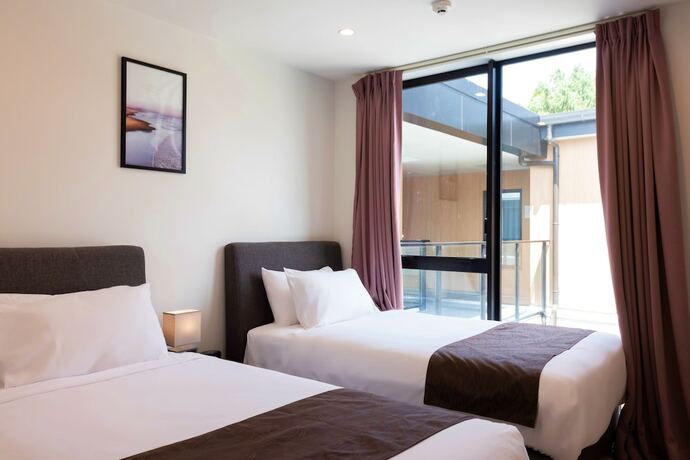 Imagen de la habitación del Hotel The Edgerley Suites. Foto 17