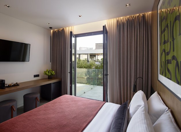 Imagen de la habitación del Hotel The Editor Athens. Foto 8