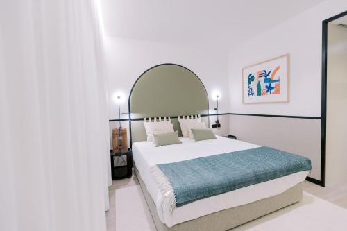 Imagen de la habitación del Hotel The Editory Garden Porto. Foto 14