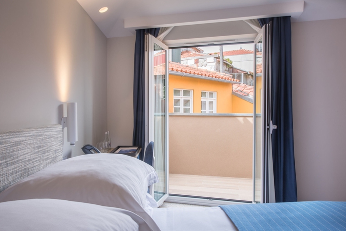 Imagen de la habitación del Hotel The Editory House Ribeira Porto. Foto 11