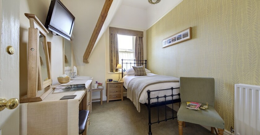 Imagen de la habitación del Hotel The Edwardene. Foto 13
