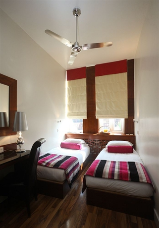 Imagen de la habitación del Hotel The Edwin London. Foto 1