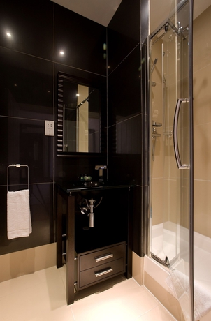 Imagen de la habitación del Hotel The Edwin London. Foto 7