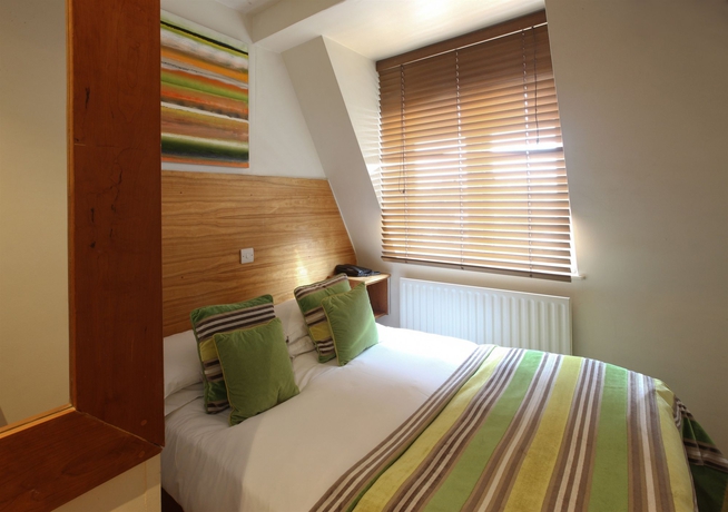 Imagen de la habitación del Hotel The Edwin London. Foto 10