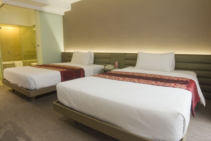 Imagen de la habitación del Hotel The E-hotel Makati. Foto 7