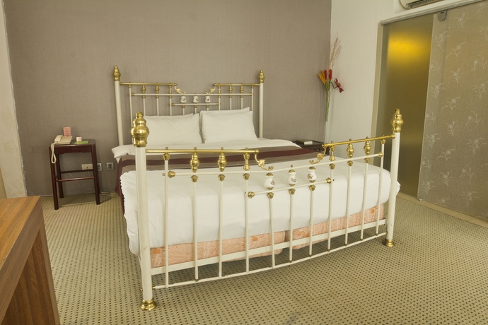 Imagen de la habitación del Hotel The E-hotel Makati. Foto 10