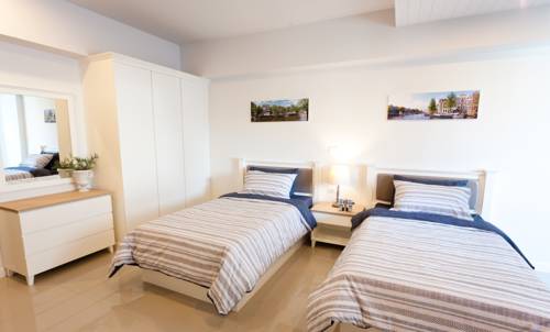 Imagen de la habitación del Hotel The Eight. Foto 8