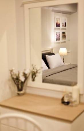 Imagen de la habitación del Hotel The Eight. Foto 15