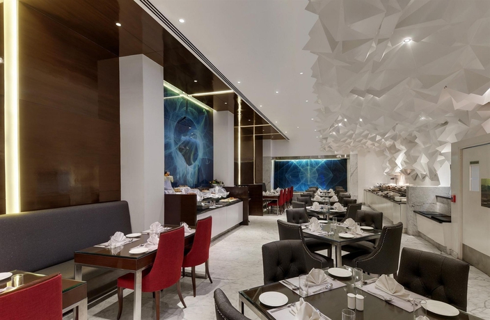 Imagen del bar/restaurante del Hotel The Elanza. Foto 3