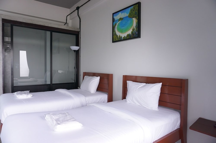 Imagen de la habitación del Hotel The Ele. Foto 2