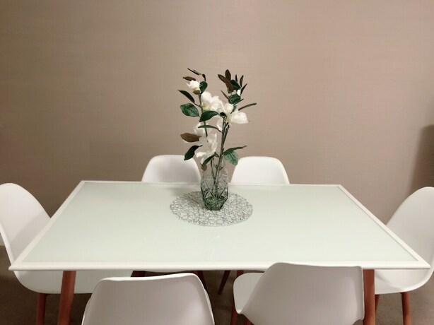 Imagen de la habitación del Hotel The Elegant Designer Home. Foto 18