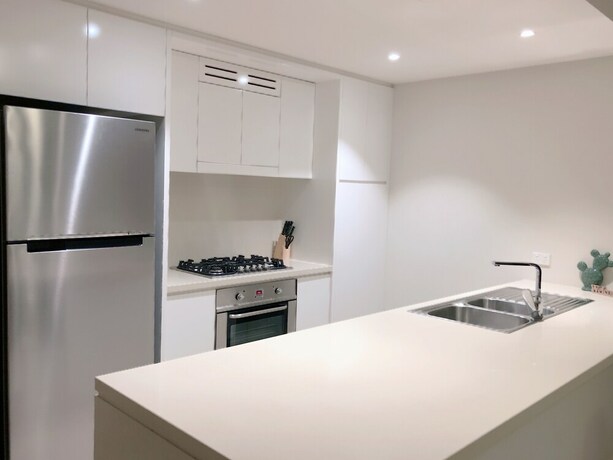 Imagen de la habitación del Hotel The Elegant Designer Home. Foto 23