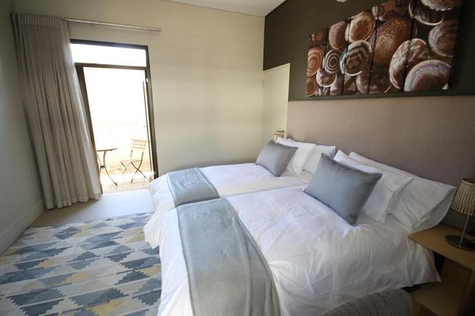 Imagen de la habitación del Hotel The Elegant Guesthouse. Foto 2