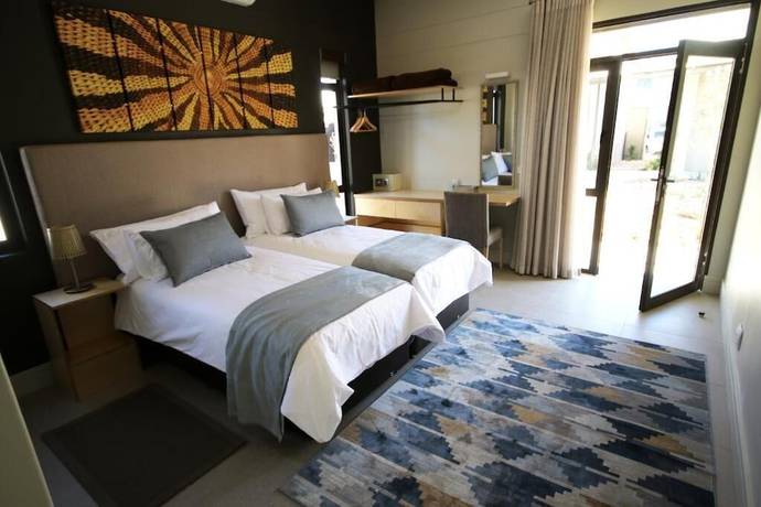 Imagen de la habitación del Hotel The Elegant Guesthouse. Foto 8