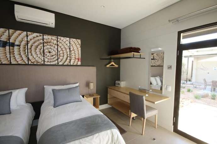 Imagen de la habitación del Hotel The Elegant Guesthouse. Foto 9